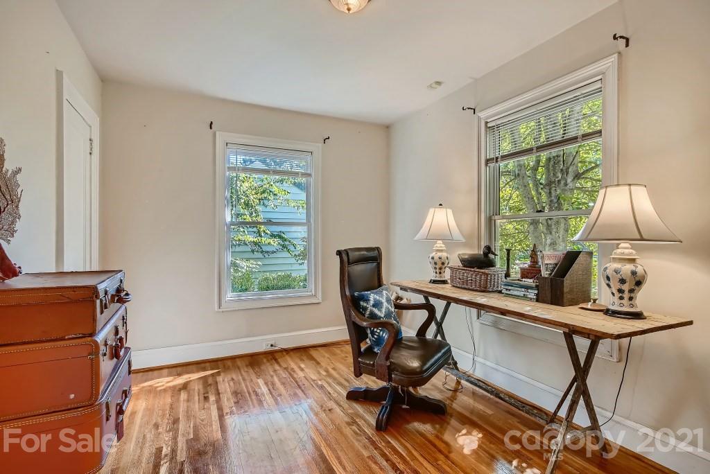 501 Marsh Road Charlotte, NC 28209 - Photo 11 of 27 a view of a workspace with furniture and a window