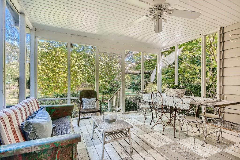 501 Marsh Road Charlotte, NC 28209 - Photo 22 of 27 a living room with furniture and a large window