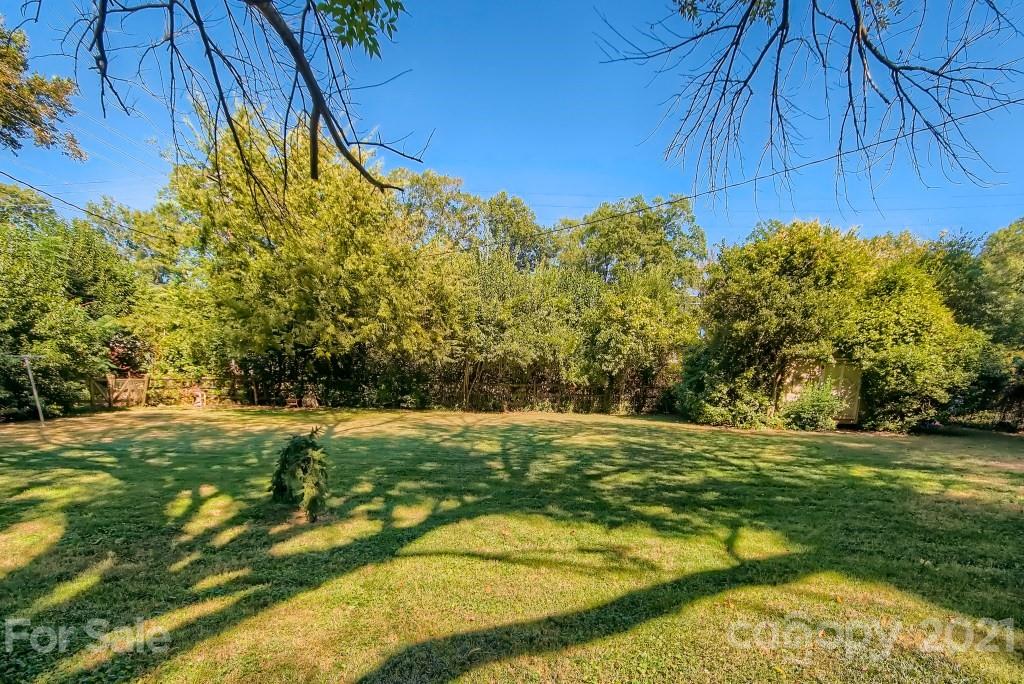 501 Marsh Road Charlotte, NC 28209 - Photo 24 of 27 a view of a yard with an outdoor space
