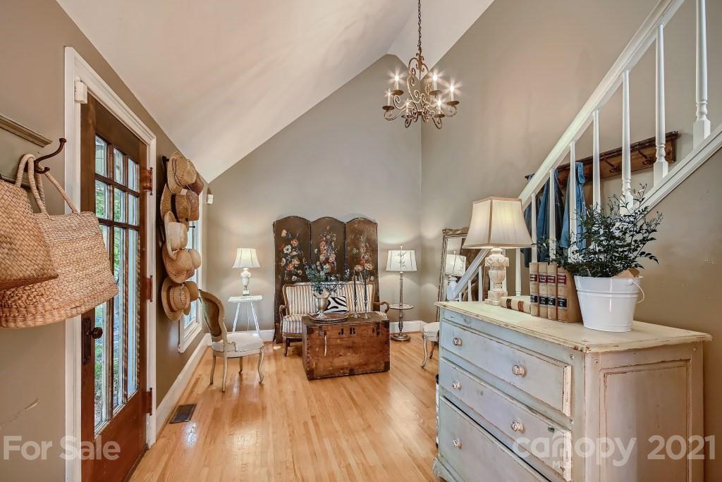 501 Marsh Road Charlotte, NC 28209 - Photo 4 of 27 a view of living room kitchen and entryway