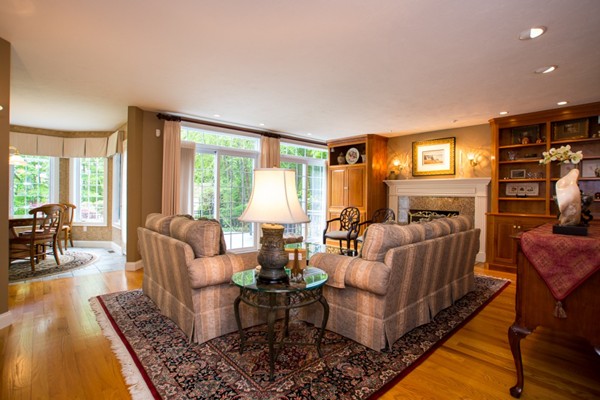 490 Douglas Road Northbridge, MA 01588 - Photo 5 of 30 a living room with furniture and a flat screen tv
