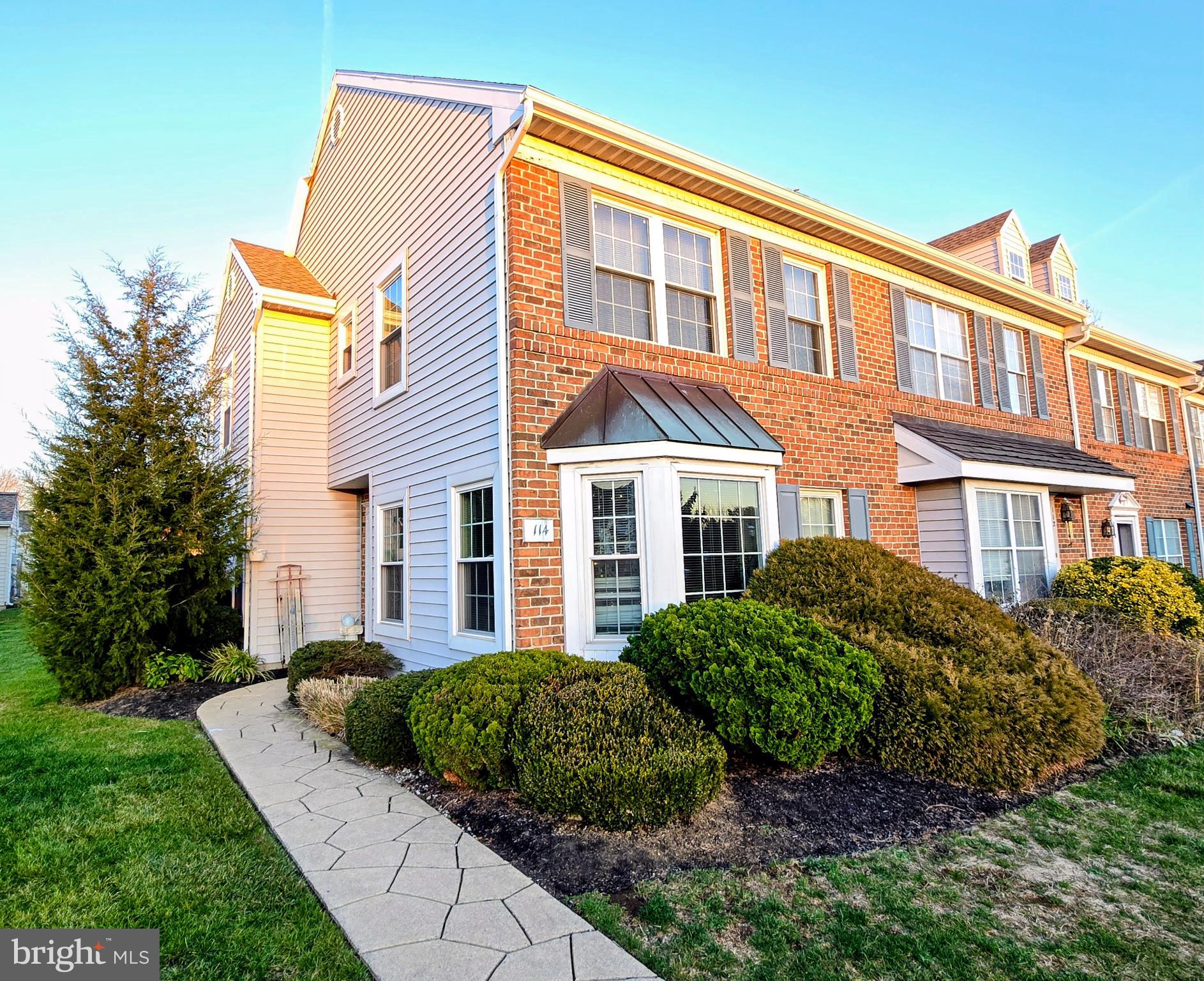 114 Delancy Place Lancaster, PA 17601 - Photo 1 of 24 a front view of a house with a garden