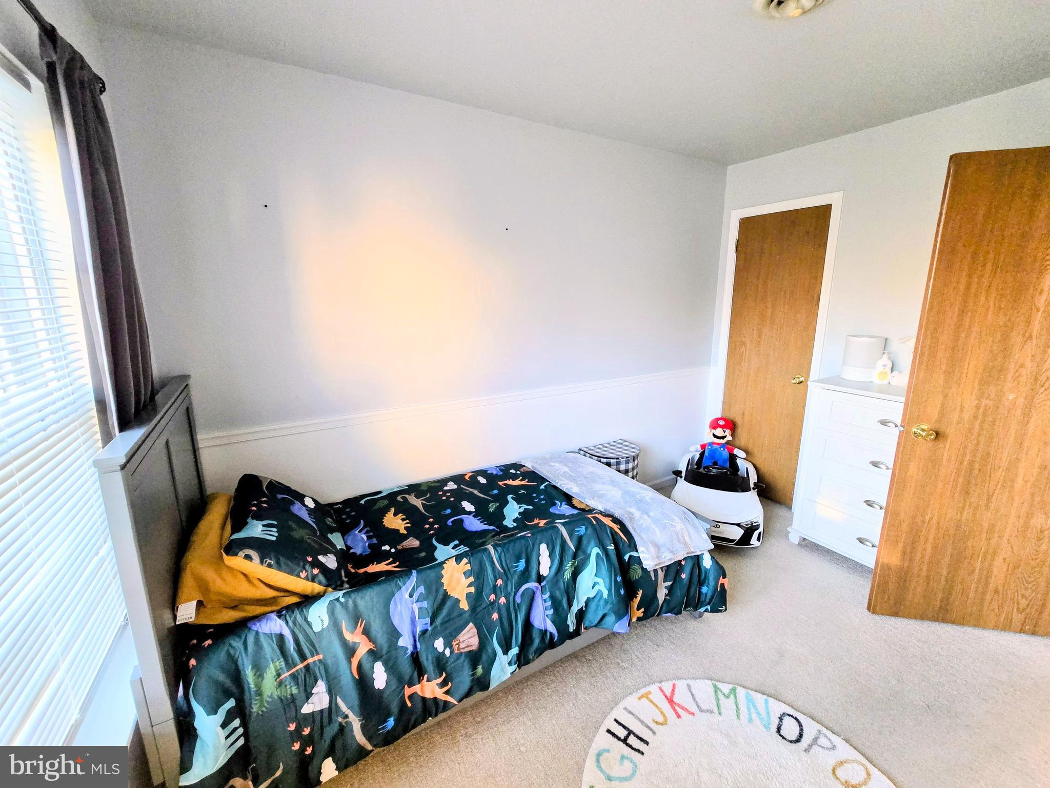 114 Delancy Place Lancaster, PA 17601 - Photo 19 of 24 a bedroom with three beds and a window