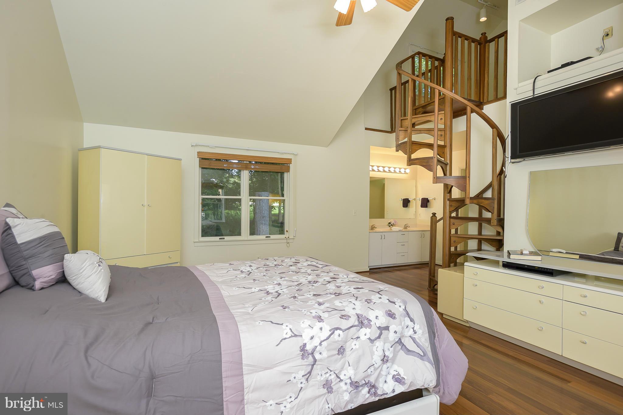 7056 Long View Road Columbia, MD 21044 - Photo 22 of 30 Spiral Staircase Leads to a Private Loft