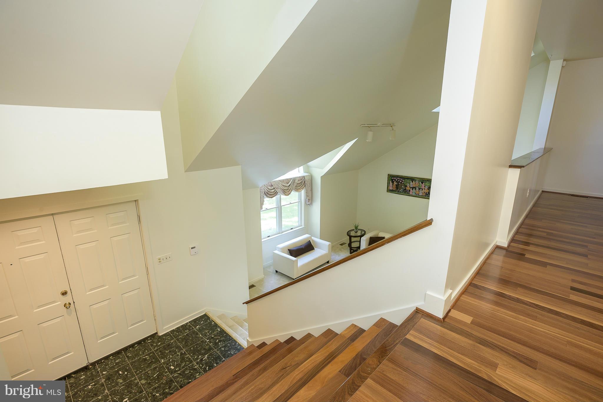 7056 Long View Road Columbia, MD 21044 - Photo 4 of 30 View of Foyer and Living from from Upper Level