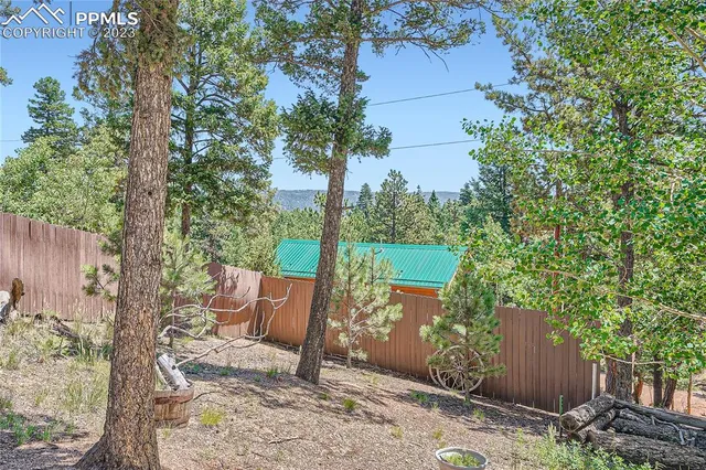 a view of a backyard with stairs