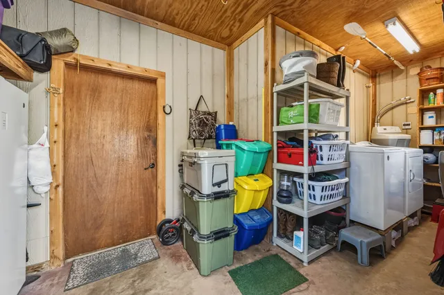 a view of a chair and tables in the patio