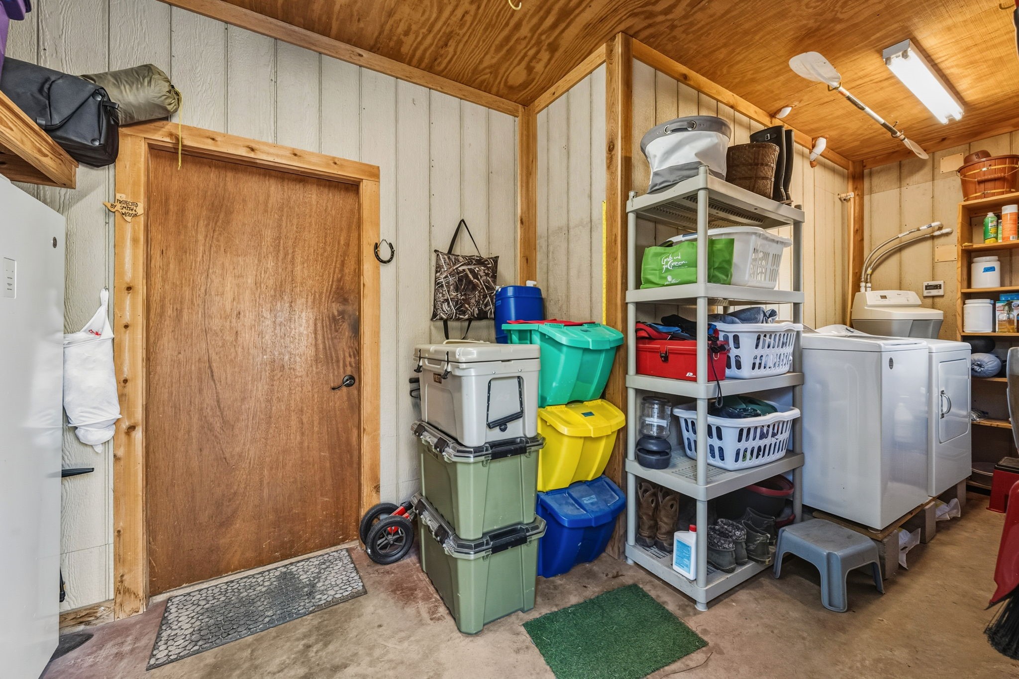 521 Camilla Lake Road Coldspring, TX 77331 - Photo 17 of 34 a view of a chair and tables in the patio