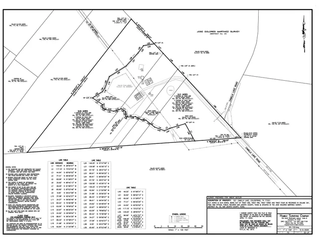 a view of a house with backyard porch and sitting area
