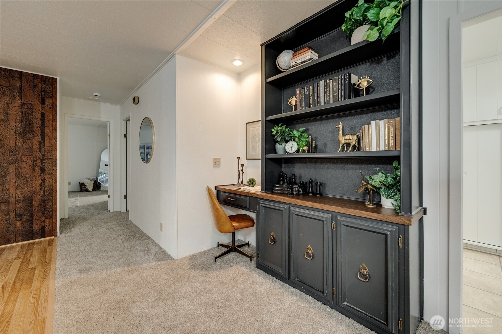 19305 127th Avenue Northeast Bothell, WA 98011 - Photo 17 of 38 a view of workspace with a bookshelf