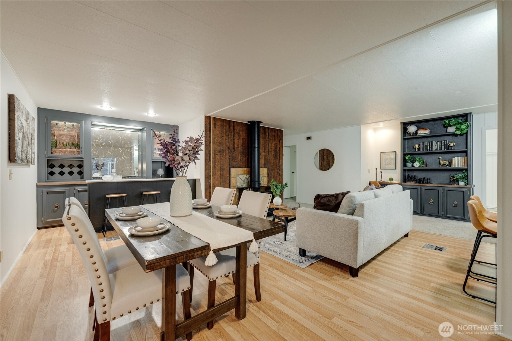 19305 127th Avenue Northeast Bothell, WA 98011 - Photo 18 of 38 a living room with furniture and wooden floor