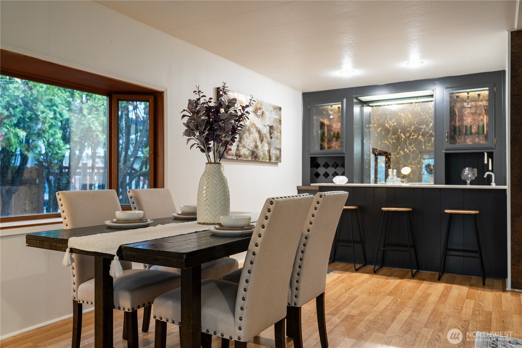 19305 127th Avenue Northeast Bothell, WA 98011 - Photo 20 of 38 a view of a dining room with furniture window and outside view