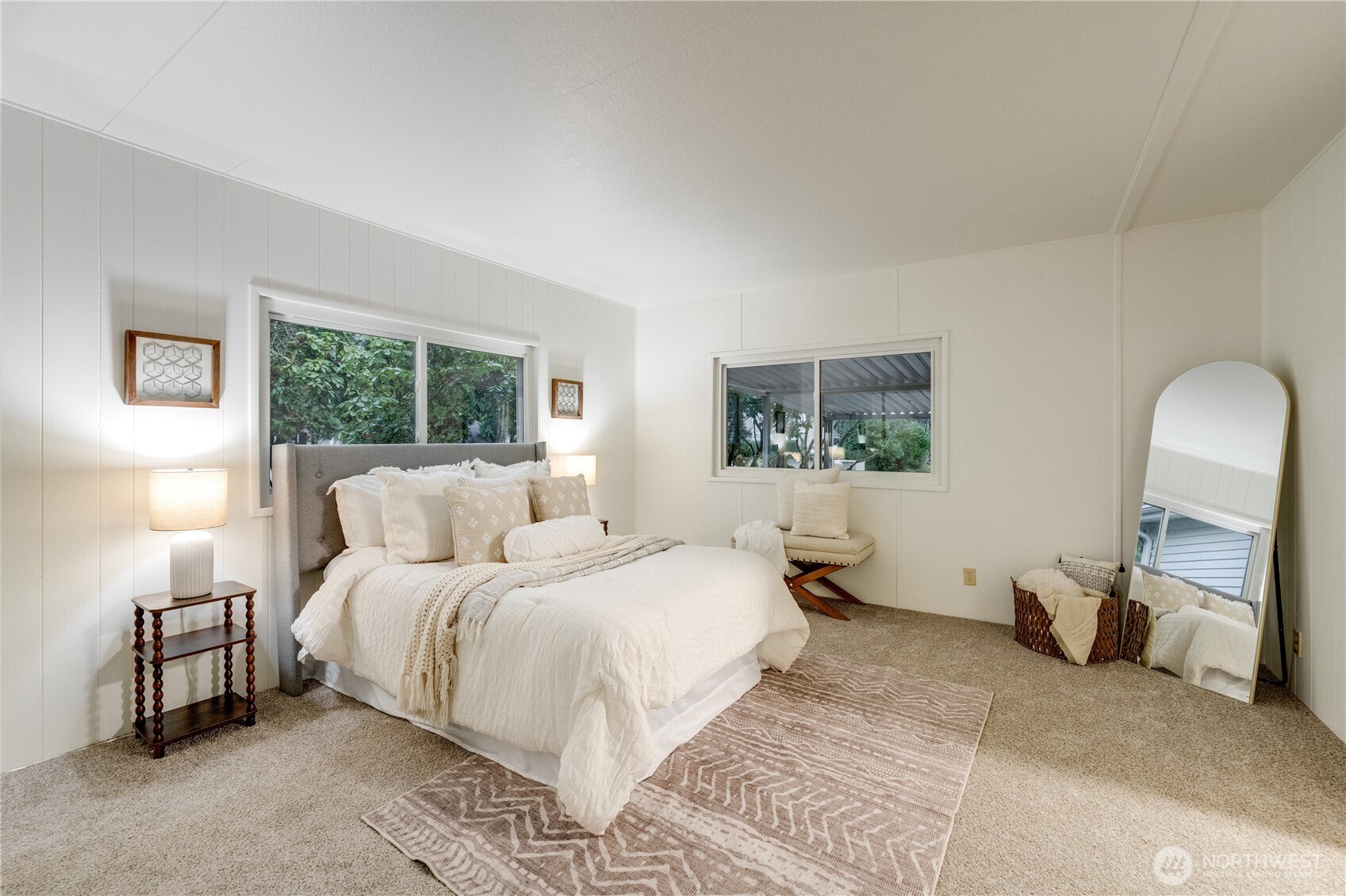 19305 127th Avenue Northeast Bothell, WA 98011 - Photo 22 of 38 a bedroom with a bed and wooden floor