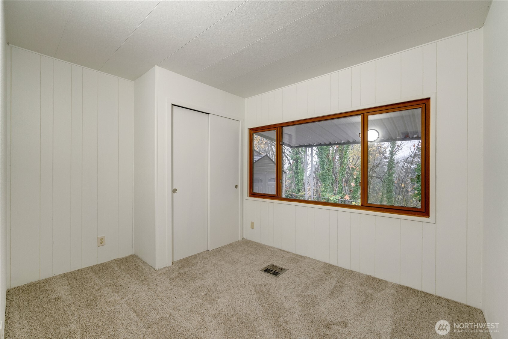 19305 127th Avenue Northeast Bothell, WA 98011 - Photo 31 of 38 a view of an empty room with a window