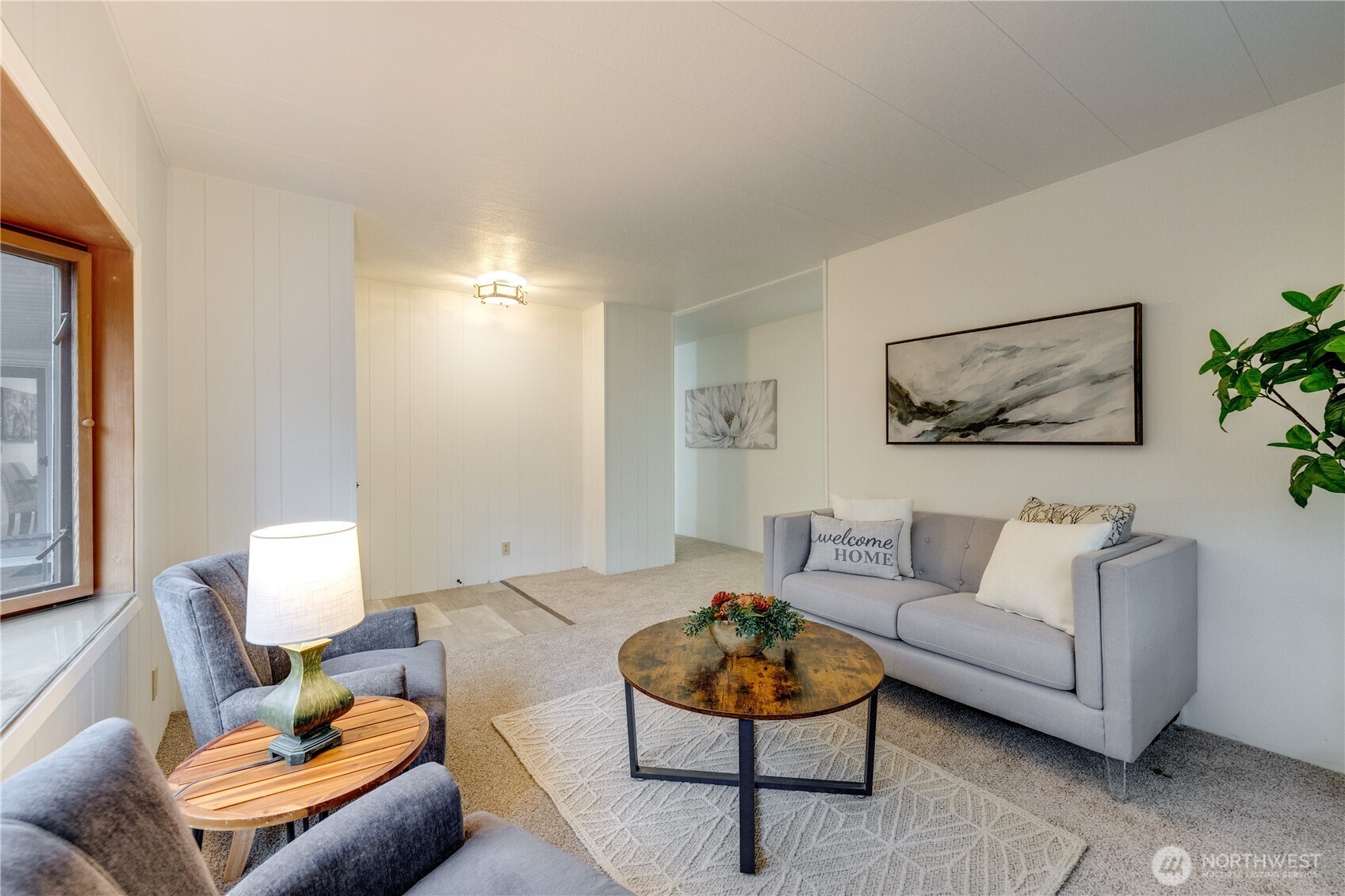 19305 127th Avenue Northeast Bothell, WA 98011 - Photo 8 of 38 a living room with furniture and a couch