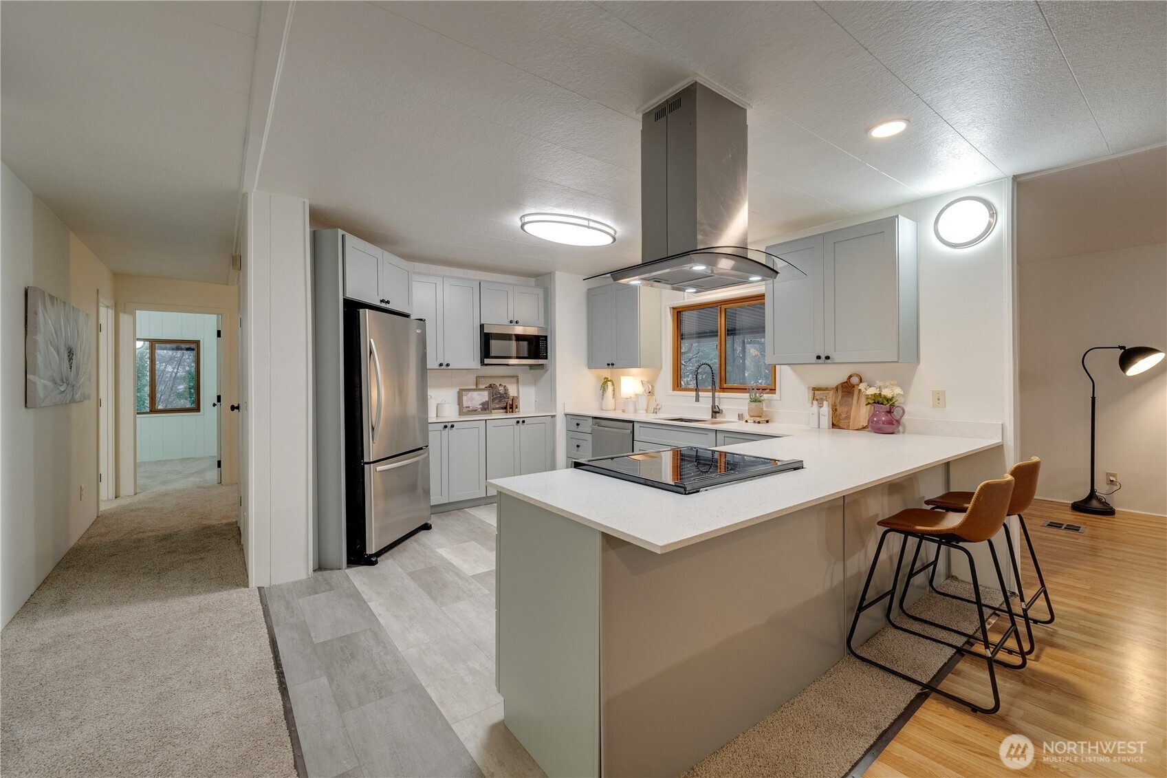 19305 127th Avenue Northeast Bothell, WA 98011 - Photo 10 of 38 a kitchen with a sink appliances and cabinets