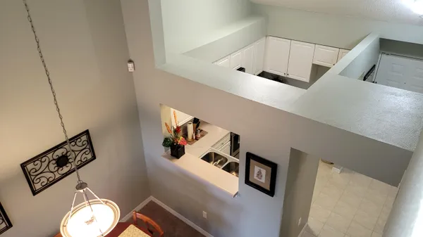 a dining room with a table and chairs