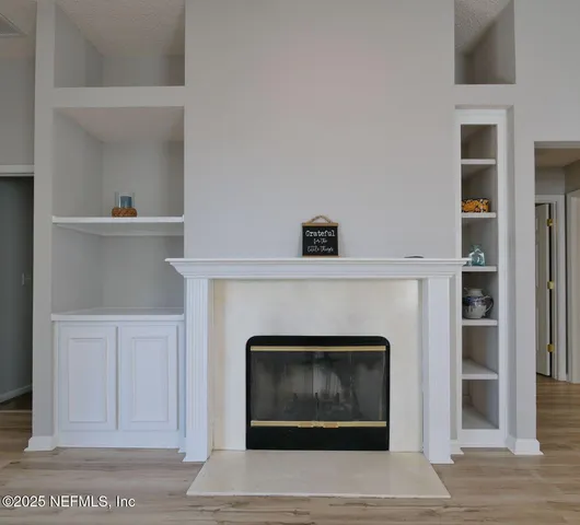 a kitchen with a sink and a stove top oven