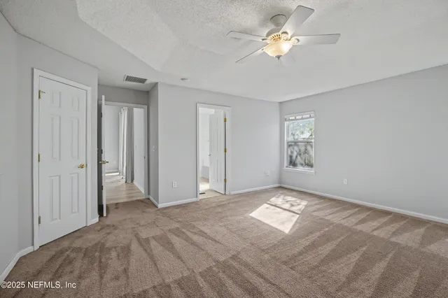 a bathroom with a tub and a shower