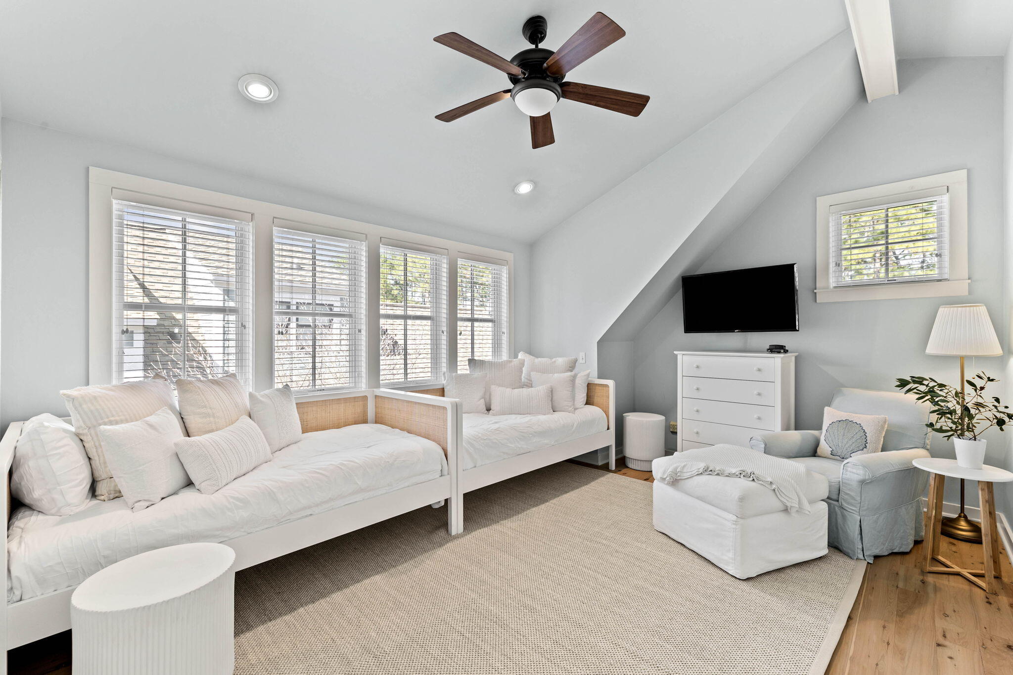 253 Salt Lane Watersound, FL 32461 - Photo 24 of 45 a living room with furniture flat screen tv and a couch