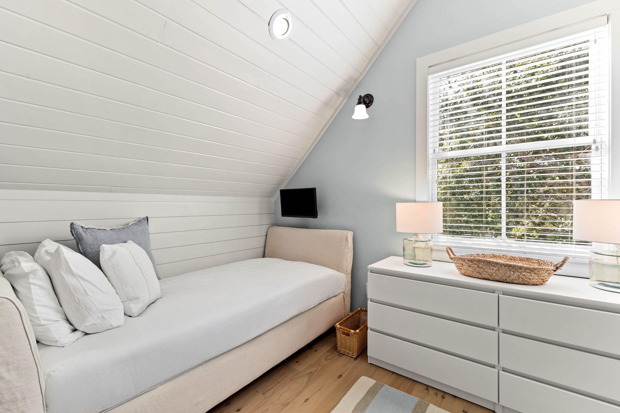 253 Salt Lane Watersound, FL 32461 - Photo 30 of 45 a bedroom with bed and a window