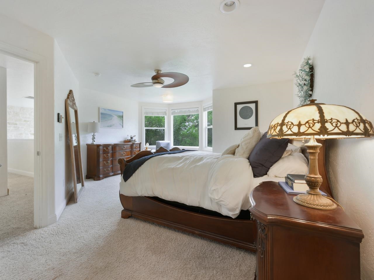 2433 H Road Grand Junction, CO 81505 - Photo 17 of 42 a bed room with a bed and a large window