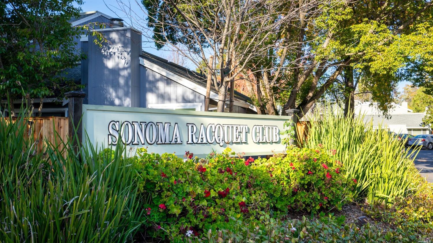 578 Racquet Club Circle Rohnert Park, CA 94928 - Photo 1 of 1 a view of a house with a small yard and wooden fence