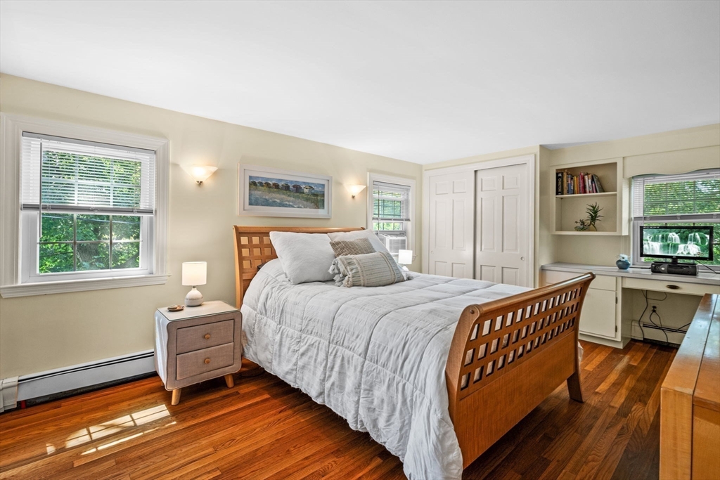 5 Orchard Circle Marblehead, MA 01945 - Photo 19 of 36 a bed room with a bed and a chair
