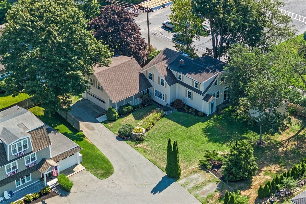 5 Orchard Circle Marblehead, MA 01945 - Photo 2 of 36 an aerial view of a house with a yard basket ball court and outdoor seating