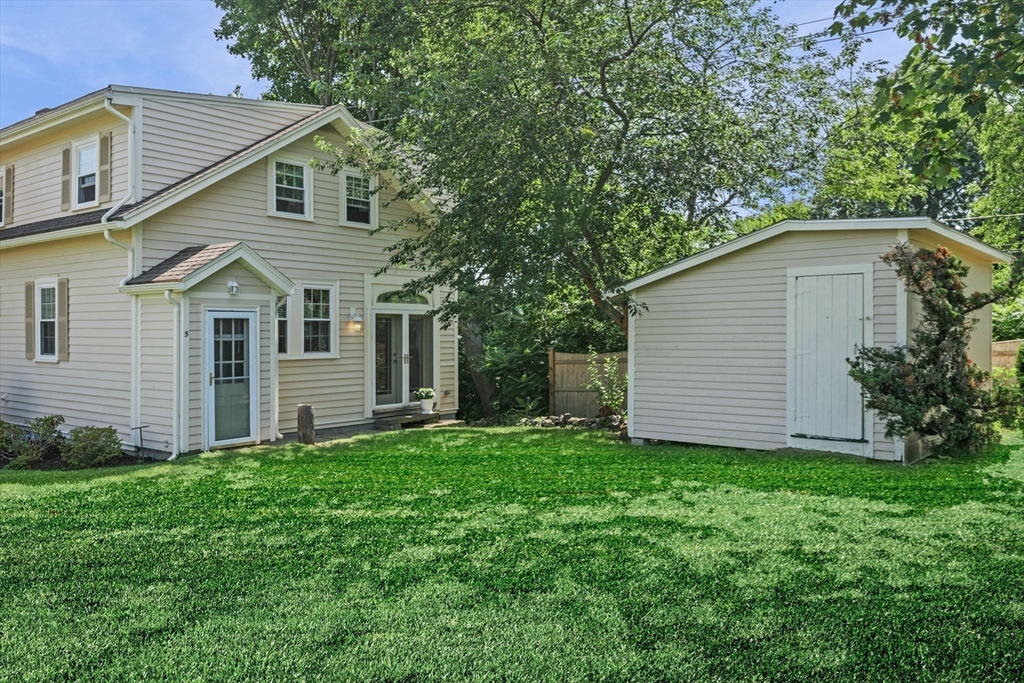 5 Orchard Circle Marblehead, MA 01945 - Photo 33 of 36 a front view of house with a garden