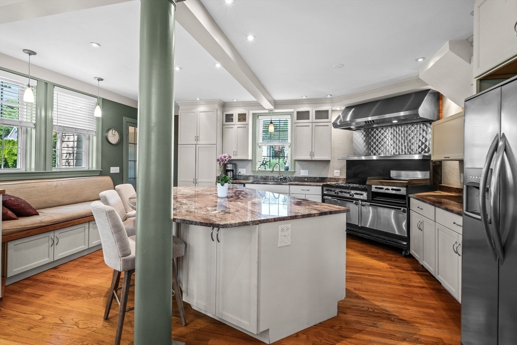 5 Orchard Circle Marblehead, MA 01945 - Photo 10 of 36 a kitchen with stainless steel appliances granite countertop a sink and a stove