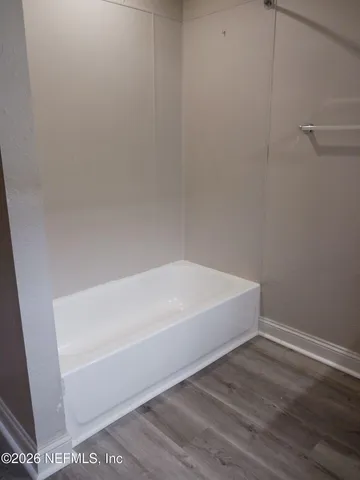 a bathroom with a bathtub