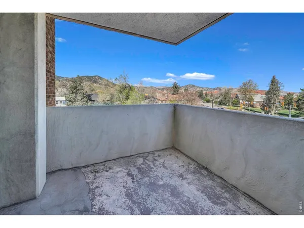 a view of a balcony with an outdoor space