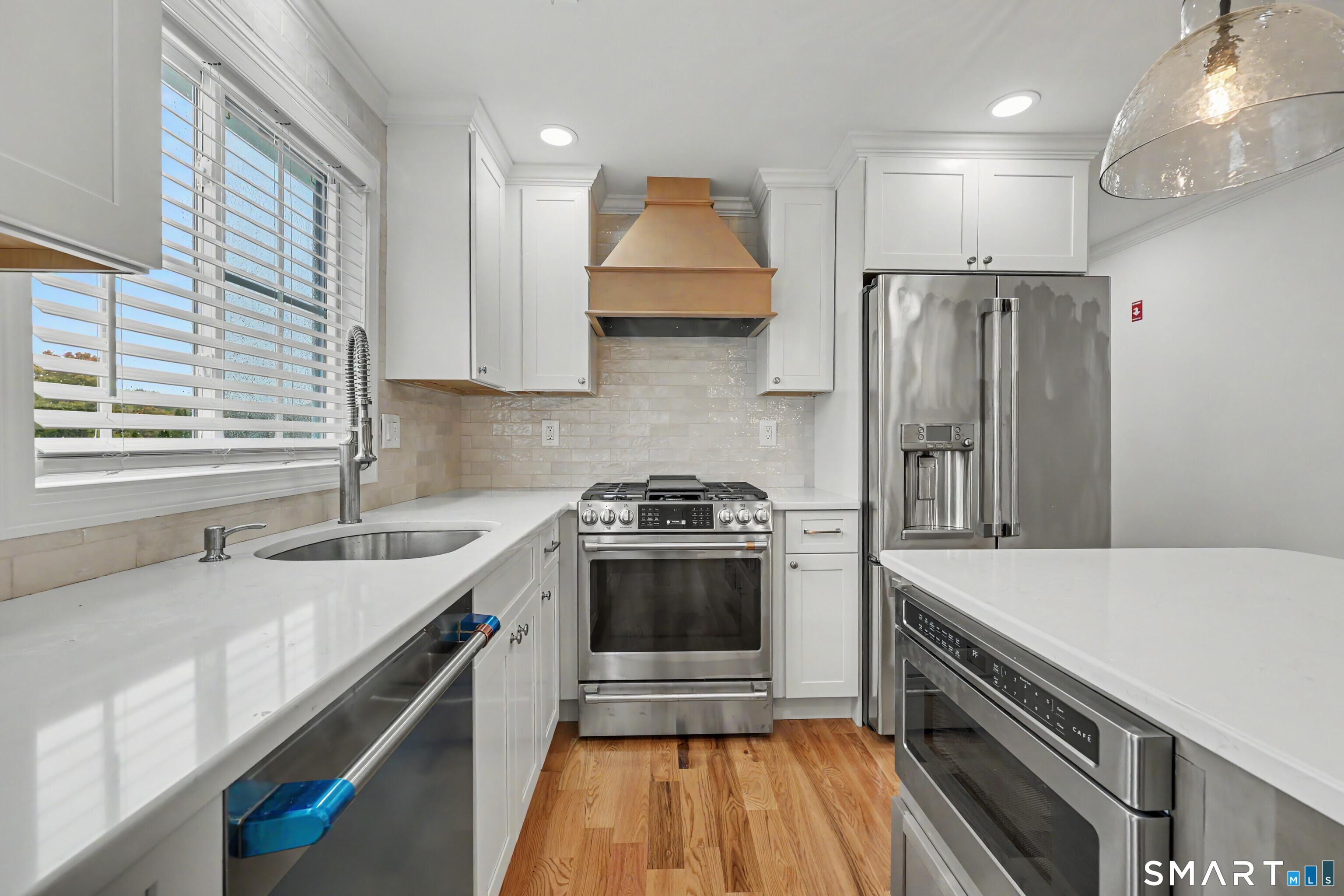 88 Sorghum Road Shelton, CT 06484 - Photo 4 of 31 Cafe appliances - under island microwave -push button glide open