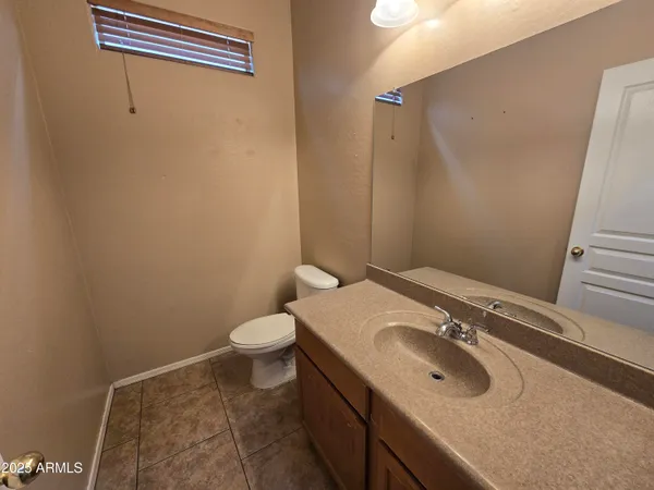 a kitchen with stainless steel appliances granite countertop sink stove and cabinets