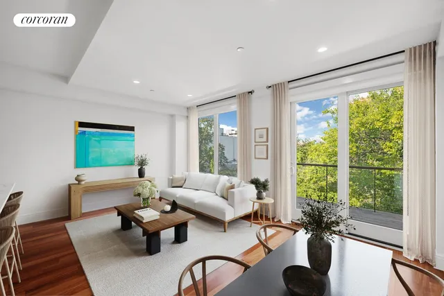 a view of living room with furniture and window