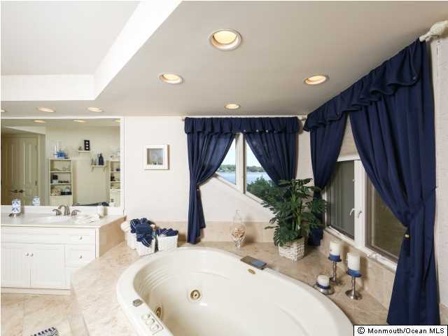 2631 River Road Point Pleasant, NJ 08742 - Photo 15 of 47 Jet tub with a tranquil water view