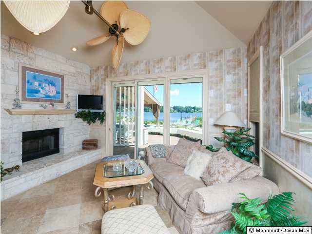 2631 River Road Point Pleasant, NJ 08742 - Photo 8 of 47 Double sided Fossil stone gas fireplace
