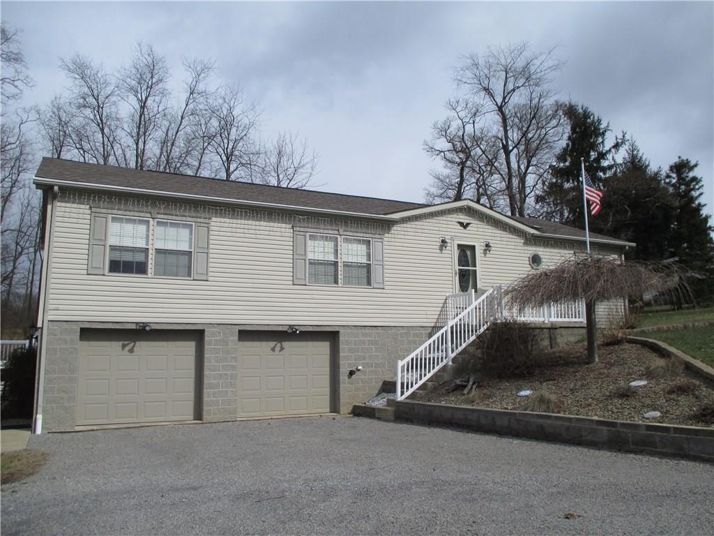435 Ridgemont Drive Industry, PA 15052 - Photo 2 of 25 Front of Home with 2 stall garage.