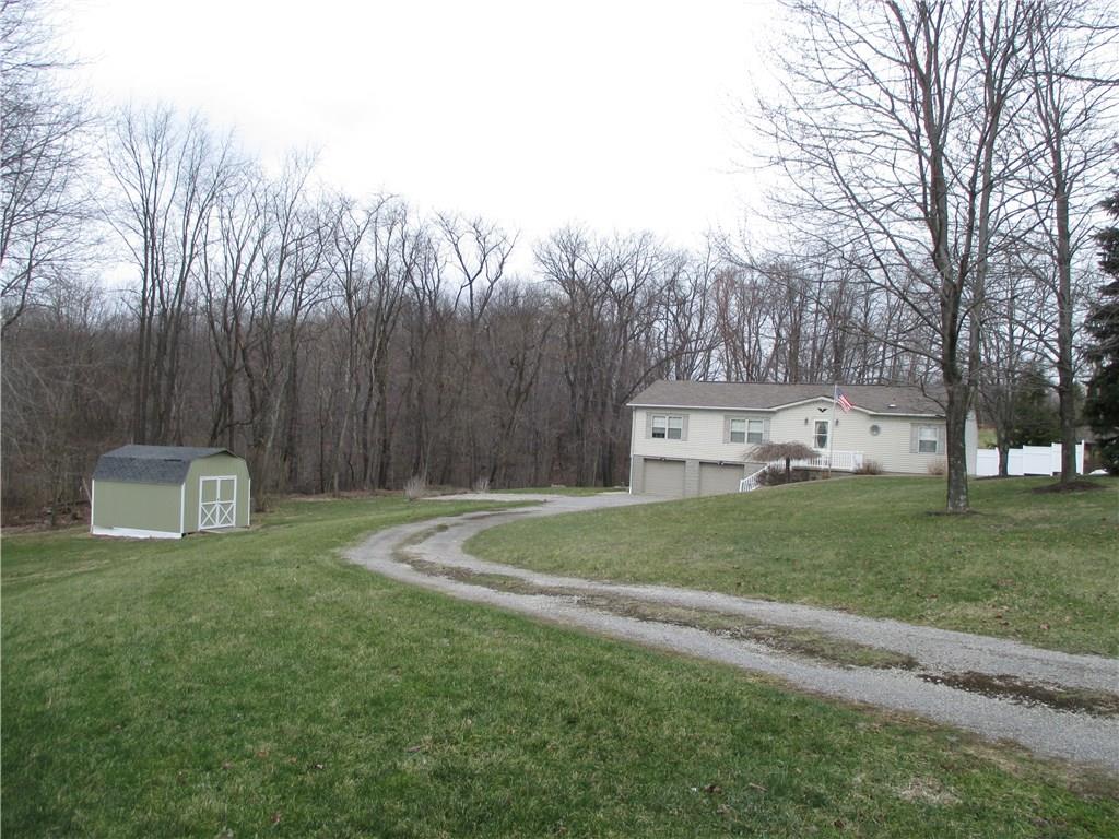 435 Ridgemont Drive Industry, PA 15052 - Photo 3 of 25 Long drive to home with shed.