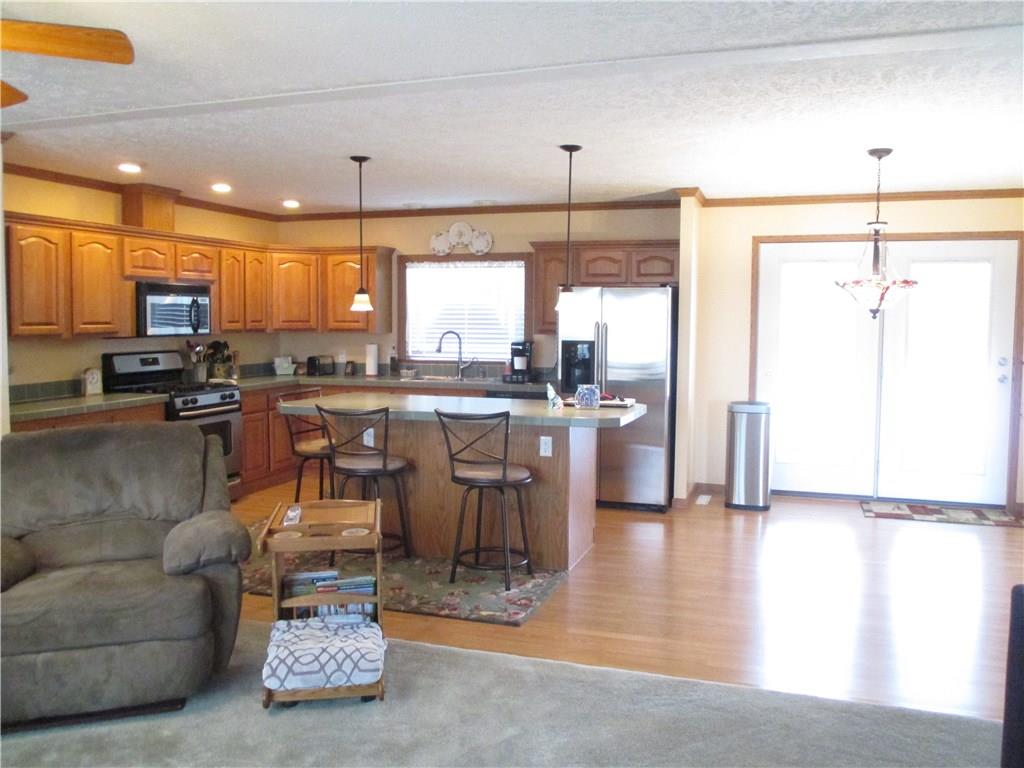 435 Ridgemont Drive Industry, PA 15052 - Photo 6 of 25 Kitchen with eating area and living room open concept.