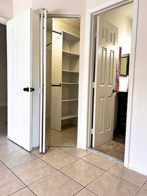 10323 Boca Bend West, Unit K4 Boca Raton, FL 33428 - Photo 13 of 25 a view of a bathroom with a door