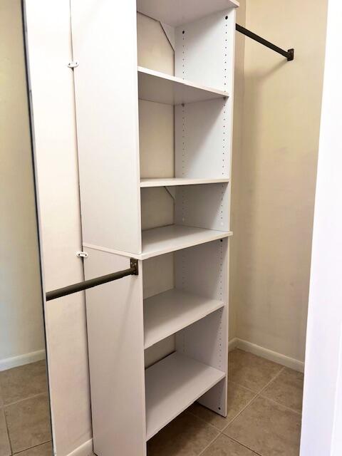 10323 Boca Bend West, Unit K4 Boca Raton, FL 33428 - Photo 14 of 25 a view of walk in closet with empty racks