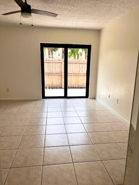 10323 Boca Bend West, Unit K4 Boca Raton, FL 33428 - Photo 15 of 25 a view of an empty room with a window