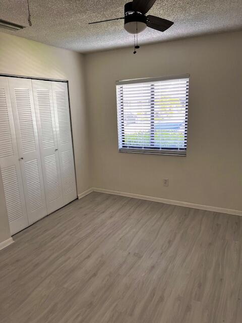 10323 Boca Bend West, Unit K4 Boca Raton, FL 33428 - Photo 18 of 25 an empty room with a window