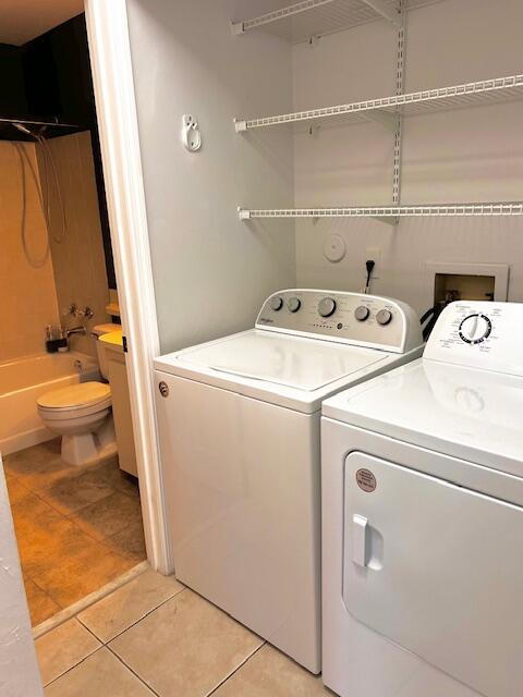 10323 Boca Bend West, Unit K4 Boca Raton, FL 33428 - Photo 19 of 25 a utility room with dryer and washer