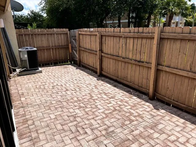 a bedroom with a bed and a cabinets