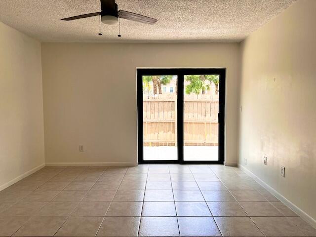 10323 Boca Bend West, Unit K4 Boca Raton, FL 33428 - Photo 7 of 25 a view of an empty room with a window
