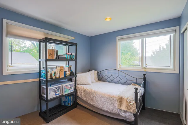 a bathroom with a toilet and a sink