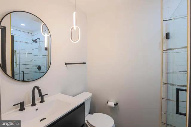 a bedroom with bed and a window